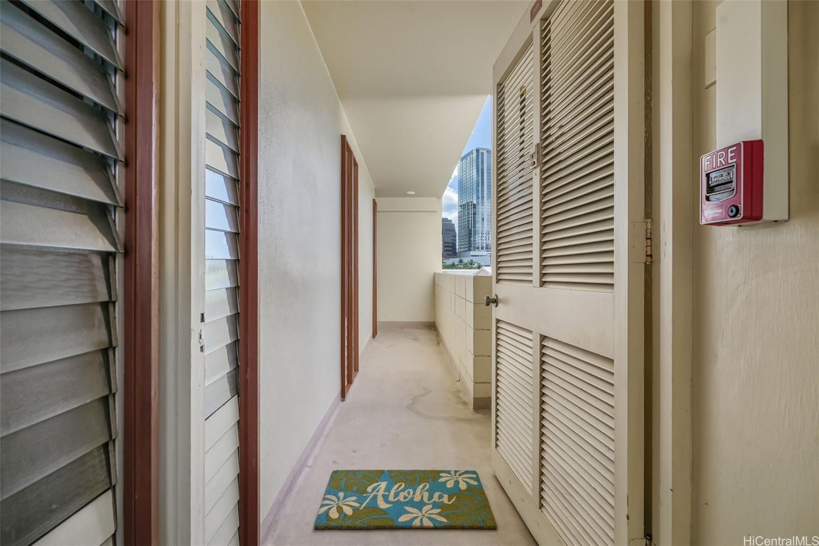 910 Ahana Street, Unit 308 Honolulu, HI 96814 - Photo 2 of 20 a view of a hallway with entryway