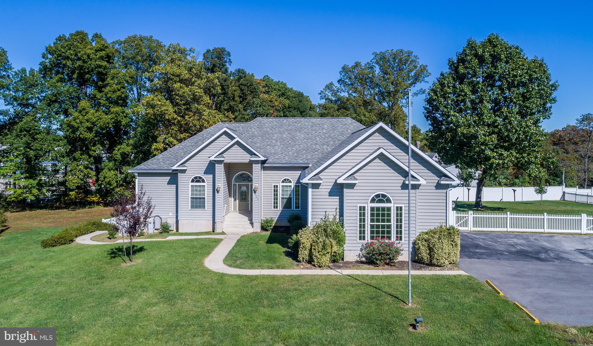 824 Andover Road Linthicum, MD 21090 - Photo 1 of 29 a front view of a house with a yard and porch