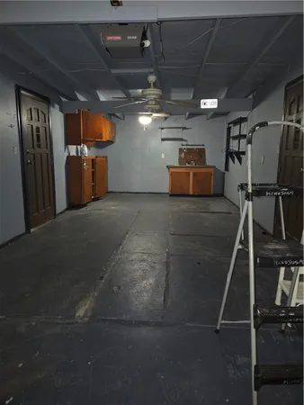 a view of parking garage with furniture