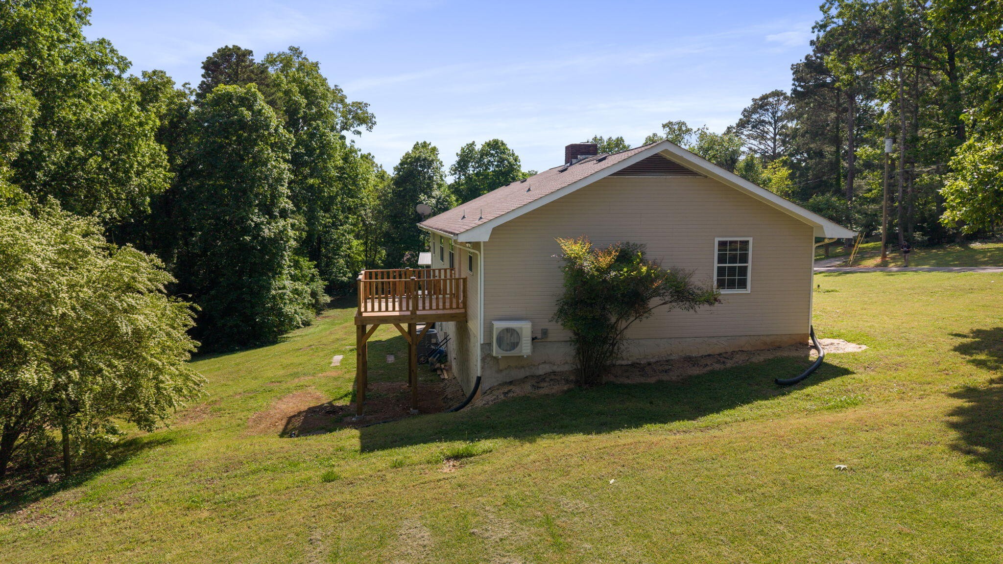 9814 Lakeside Road Harrison, TN 37341 - Photo 29 of 35 a view of a house with backyard and trees