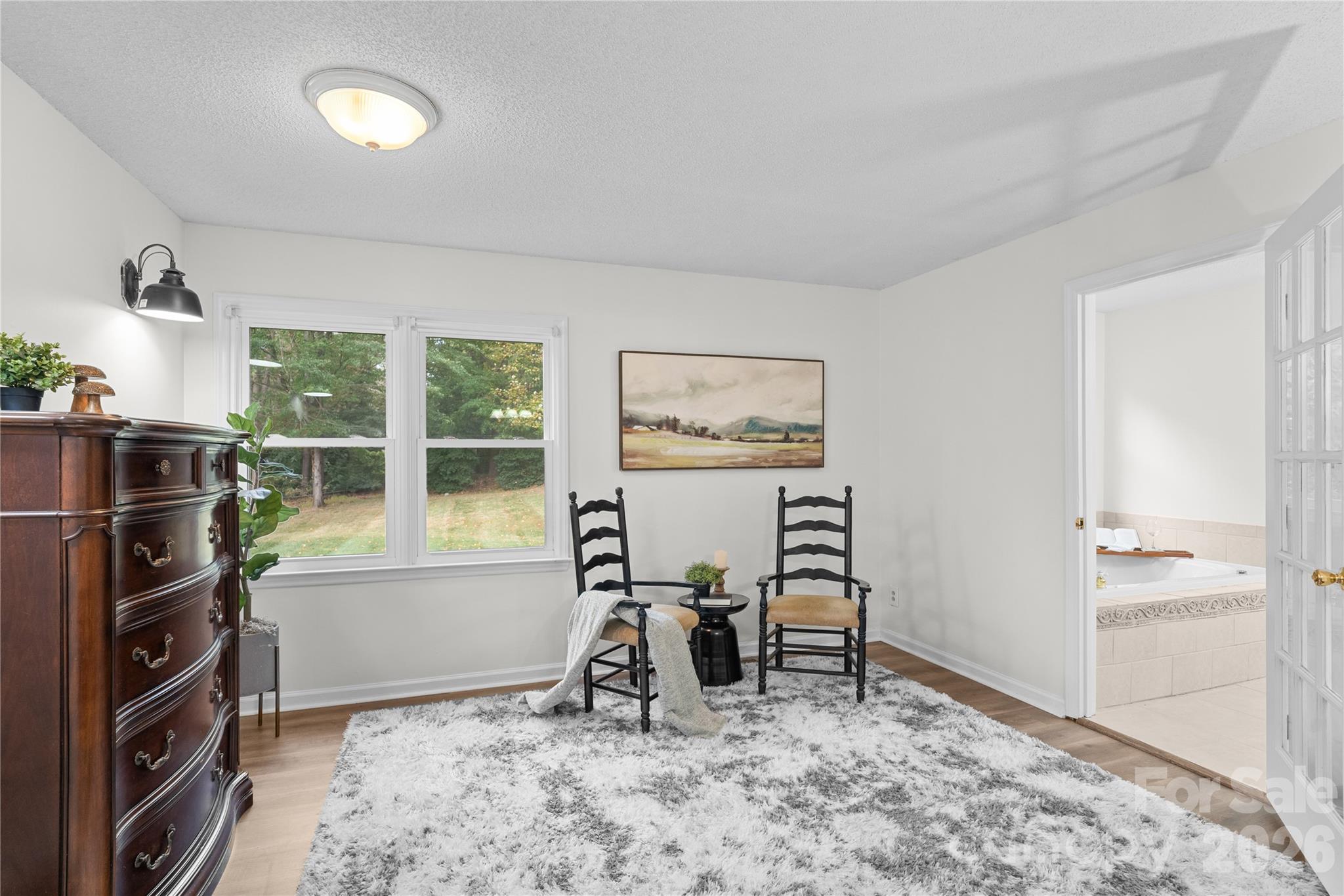 1335 Blacksnake Road Stanley, NC 28164 - Photo 16 of 31 a view of a livingroom with furniture and windows