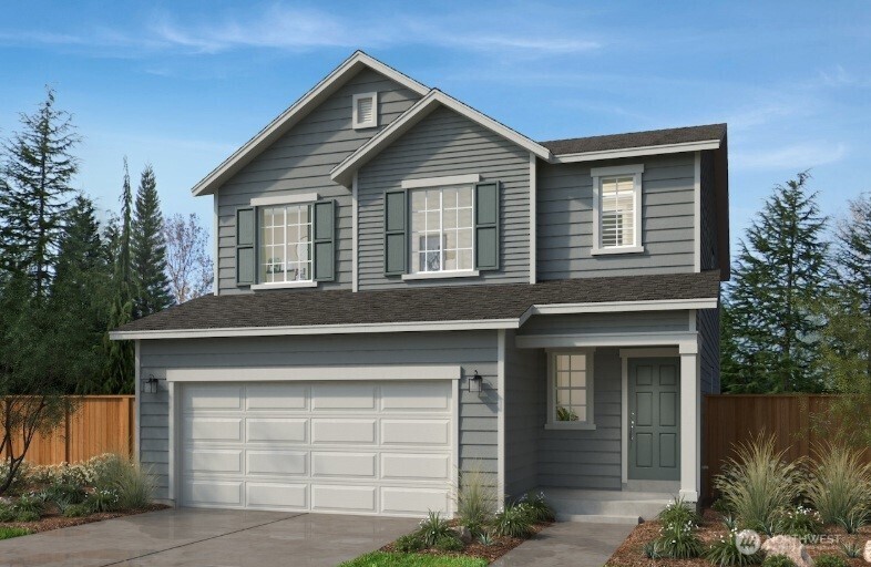 23931 36 Avenue Southeast, Unit 16 Bothell, WA 98021 - Photo 1 of 3 a front view of a house with garden