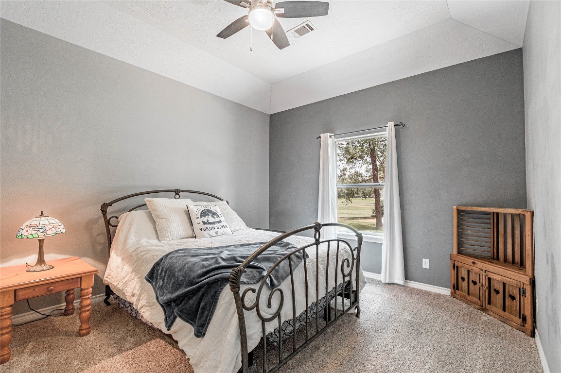 22 Greenway Drive Trinity, TX 75862 - Photo 19 of 29 a bedroom with a bed and a window
