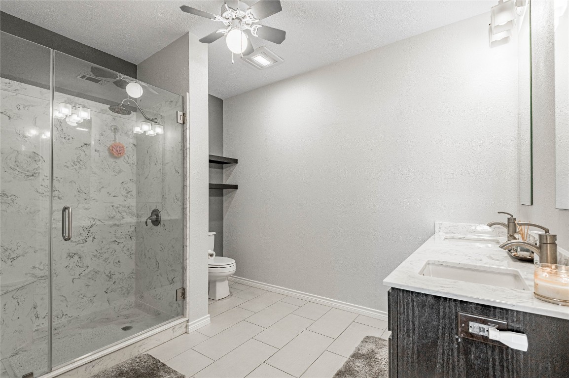 22 Greenway Drive Trinity, TX 75862 - Photo 20 of 29 a bathroom with a sink a toilet and shower