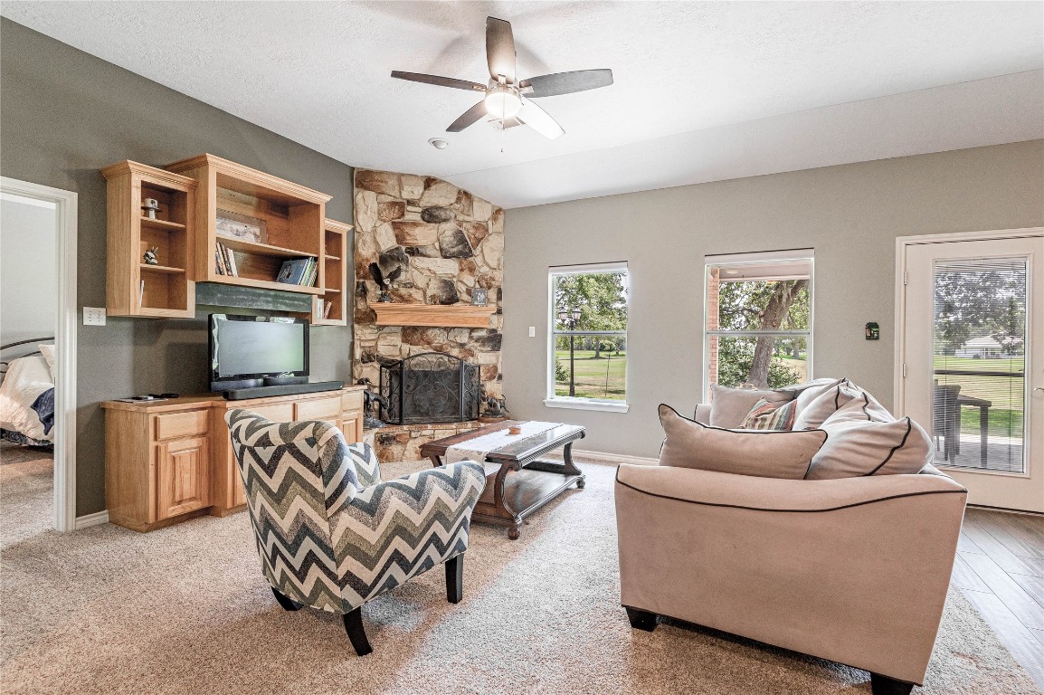 22 Greenway Drive Trinity, TX 75862 - Photo 10 of 29 a living room with furniture and a fireplace
