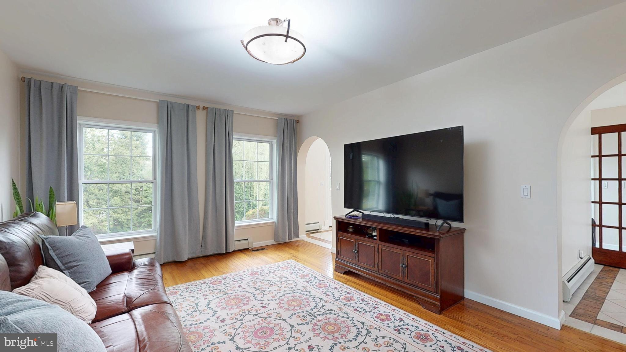 226 Ark Road Mount Laurel, NJ 08054 - Photo 20 of 60 a living room with furniture and a flat screen tv