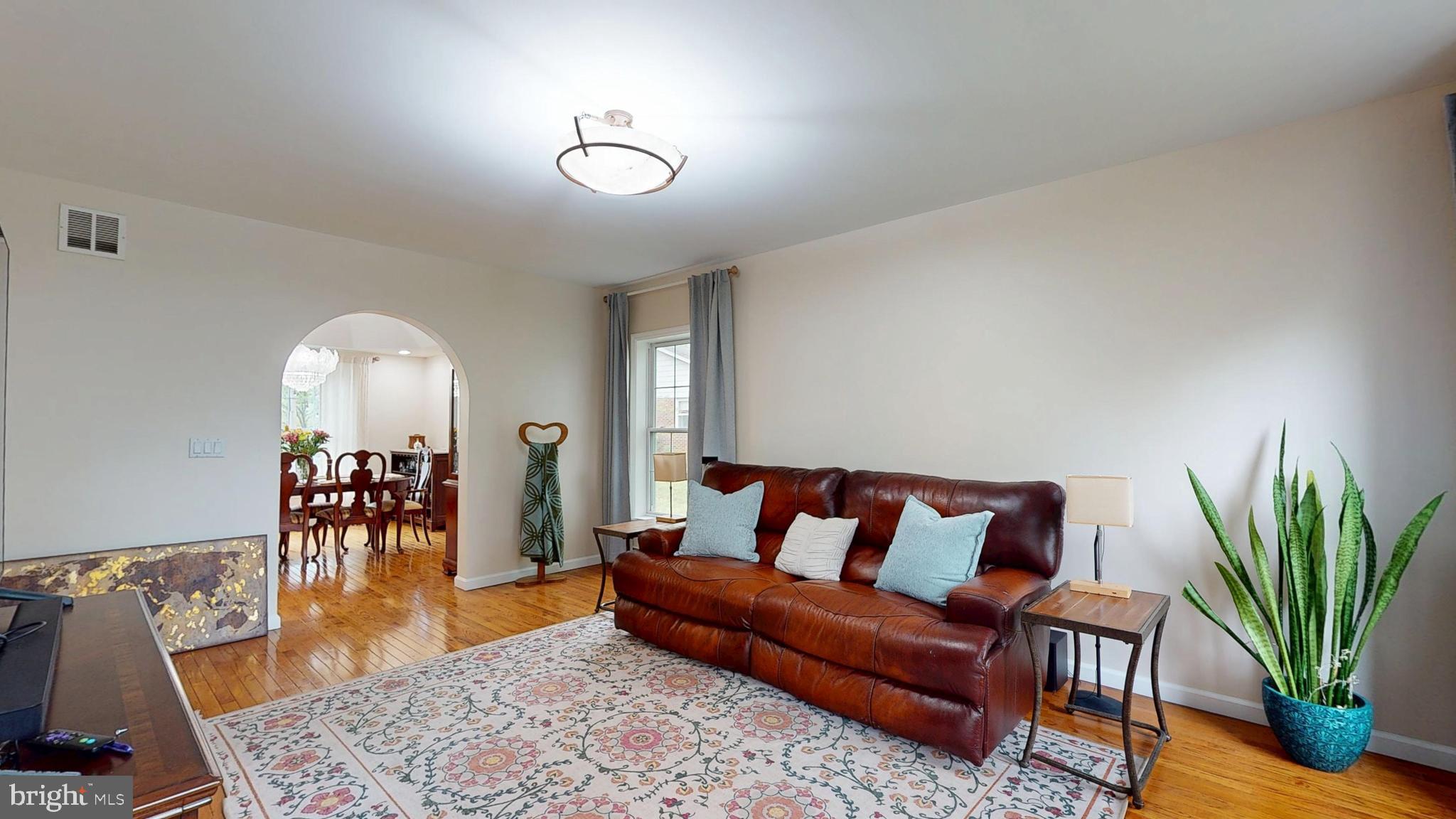 226 Ark Road Mount Laurel, NJ 08054 - Photo 21 of 60 a living room with furniture and a chandelier