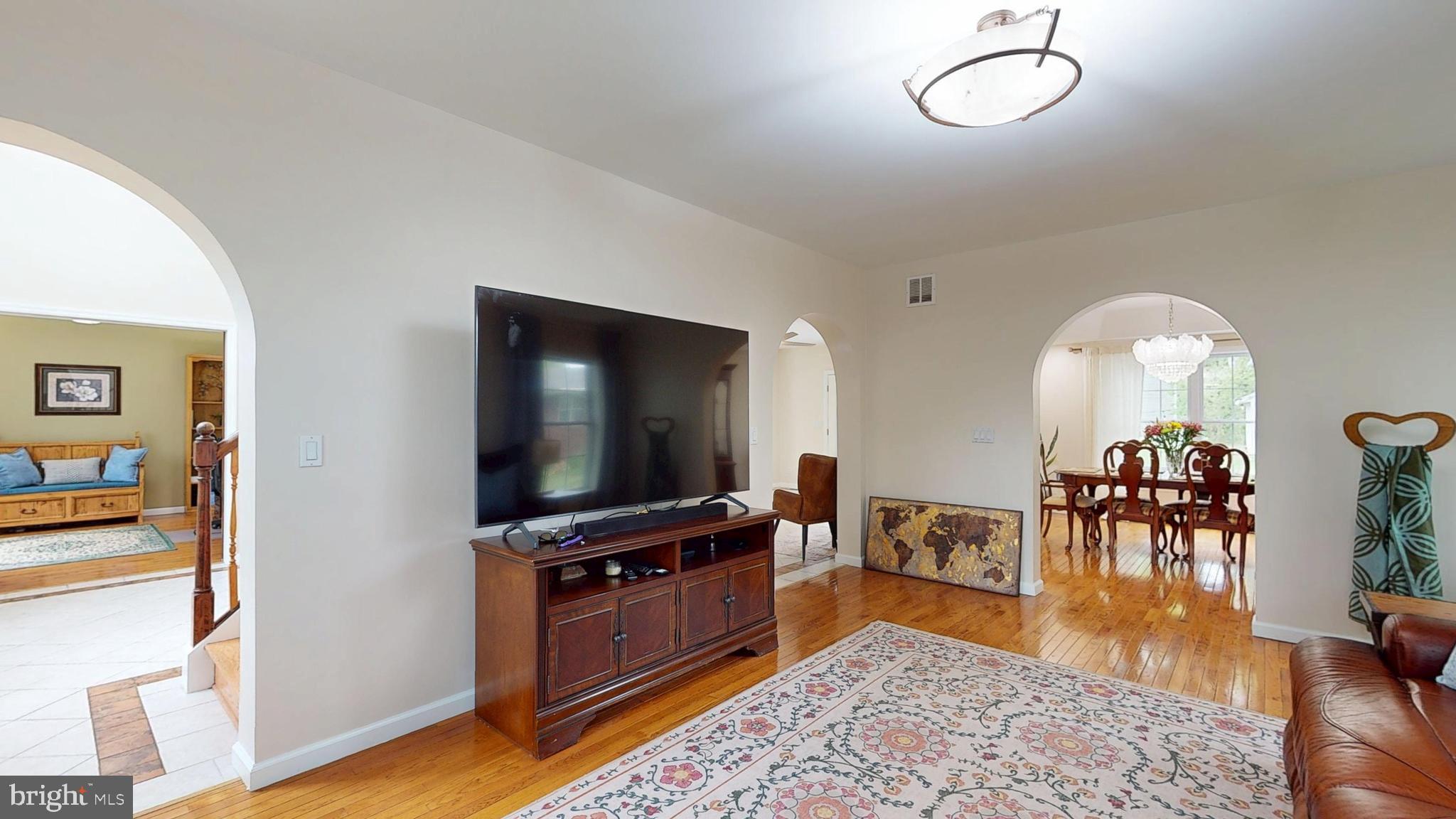 226 Ark Road Mount Laurel, NJ 08054 - Photo 22 of 60 a living room with furniture and a flat screen tv
