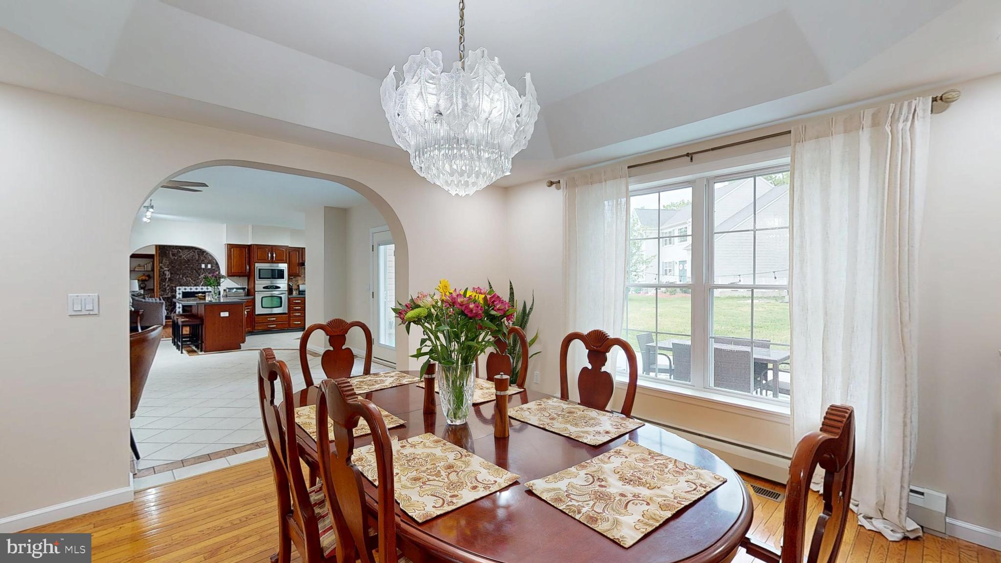 226 Ark Road Mount Laurel, NJ 08054 - Photo 26 of 60 a view of a dining room with furniture window and wooden floor