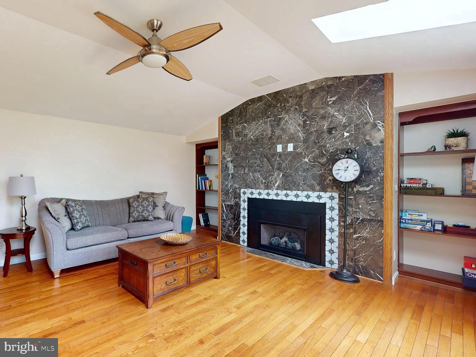 226 Ark Road Mount Laurel, NJ 08054 - Photo 32 of 60 a living room with furniture and a fireplace