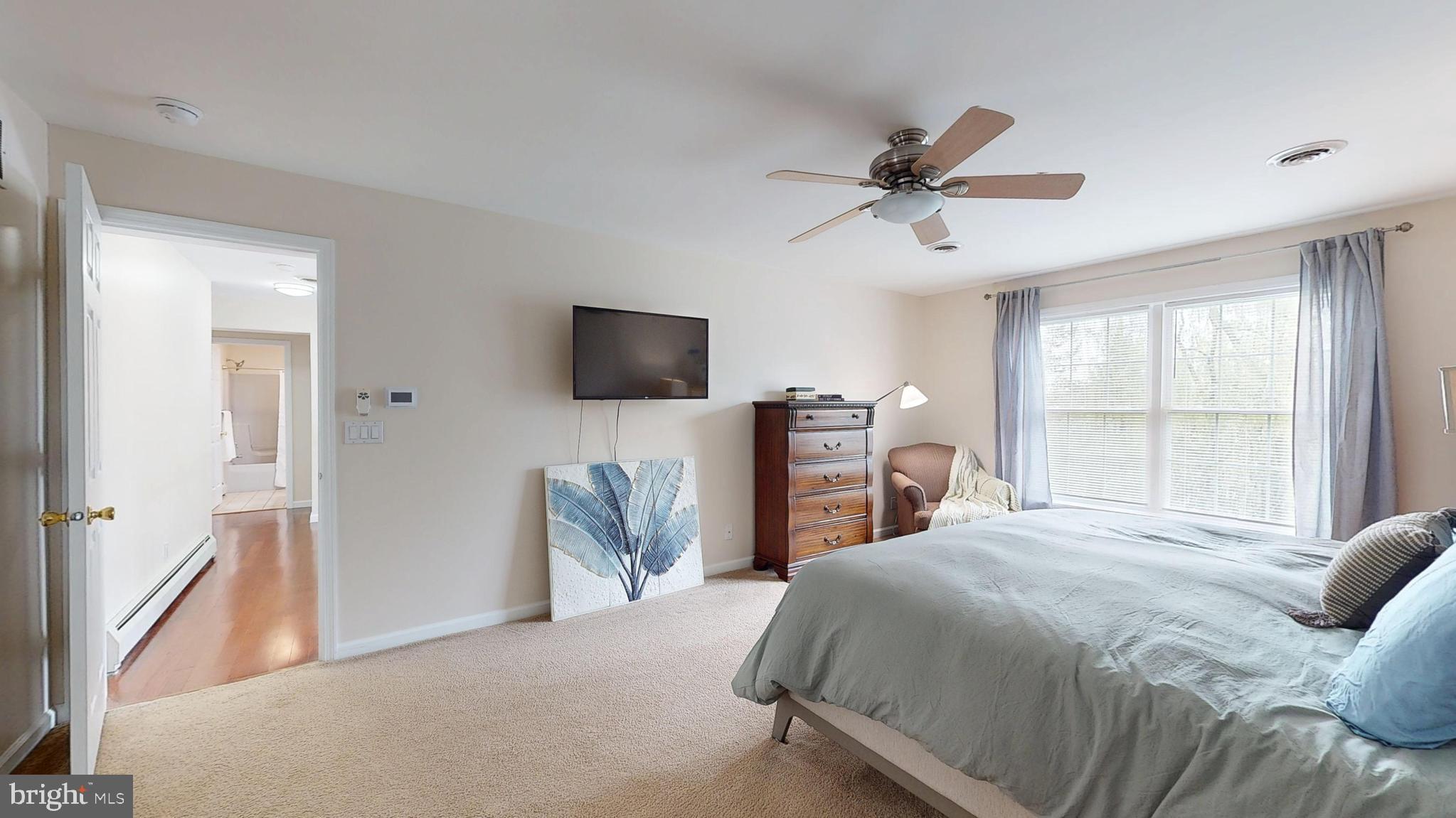 226 Ark Road Mount Laurel, NJ 08054 - Photo 33 of 60 a bedroom with a bed and a flat screen tv