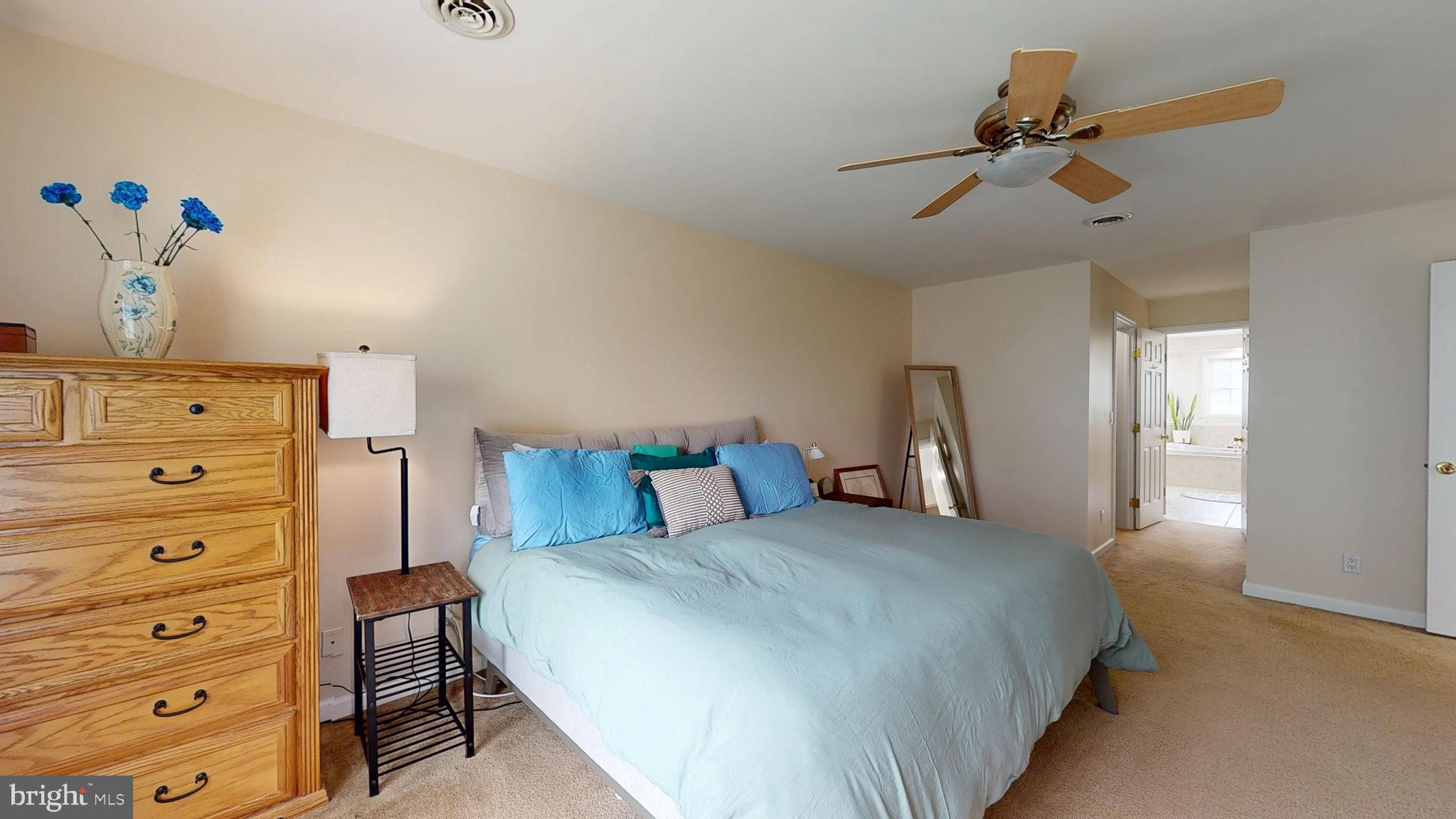 226 Ark Road Mount Laurel, NJ 08054 - Photo 34 of 60 a bedroom with a bed and a dresser