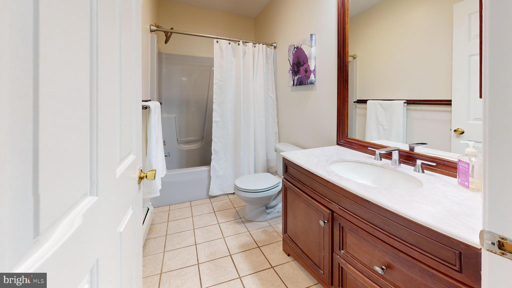 226 Ark Road Mount Laurel, NJ 08054 - Photo 44 of 60 a spacious bathroom with a sink a toilet and shower