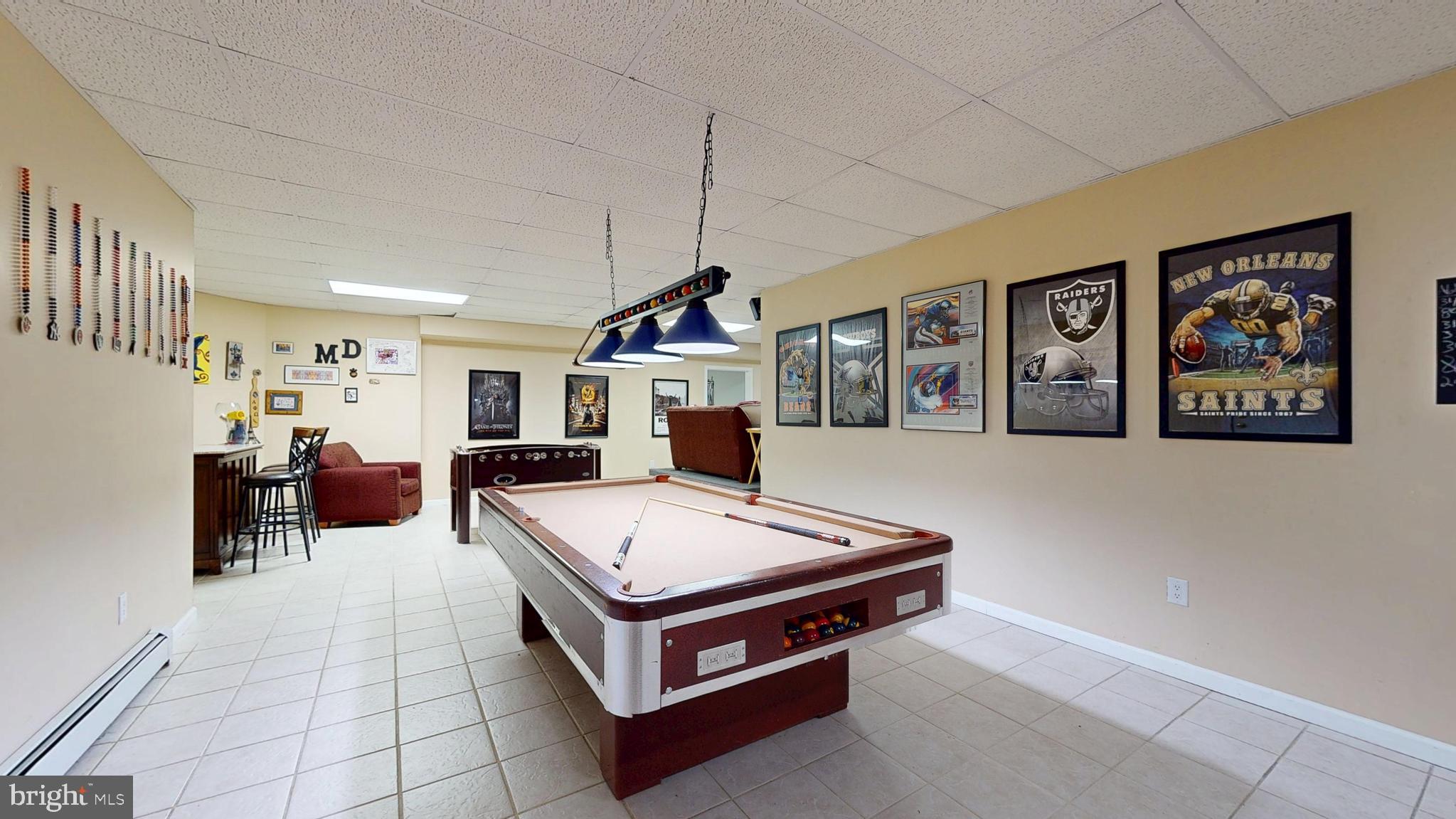 226 Ark Road Mount Laurel, NJ 08054 - Photo 49 of 60 a living room with furniture a table and a flat screen tv