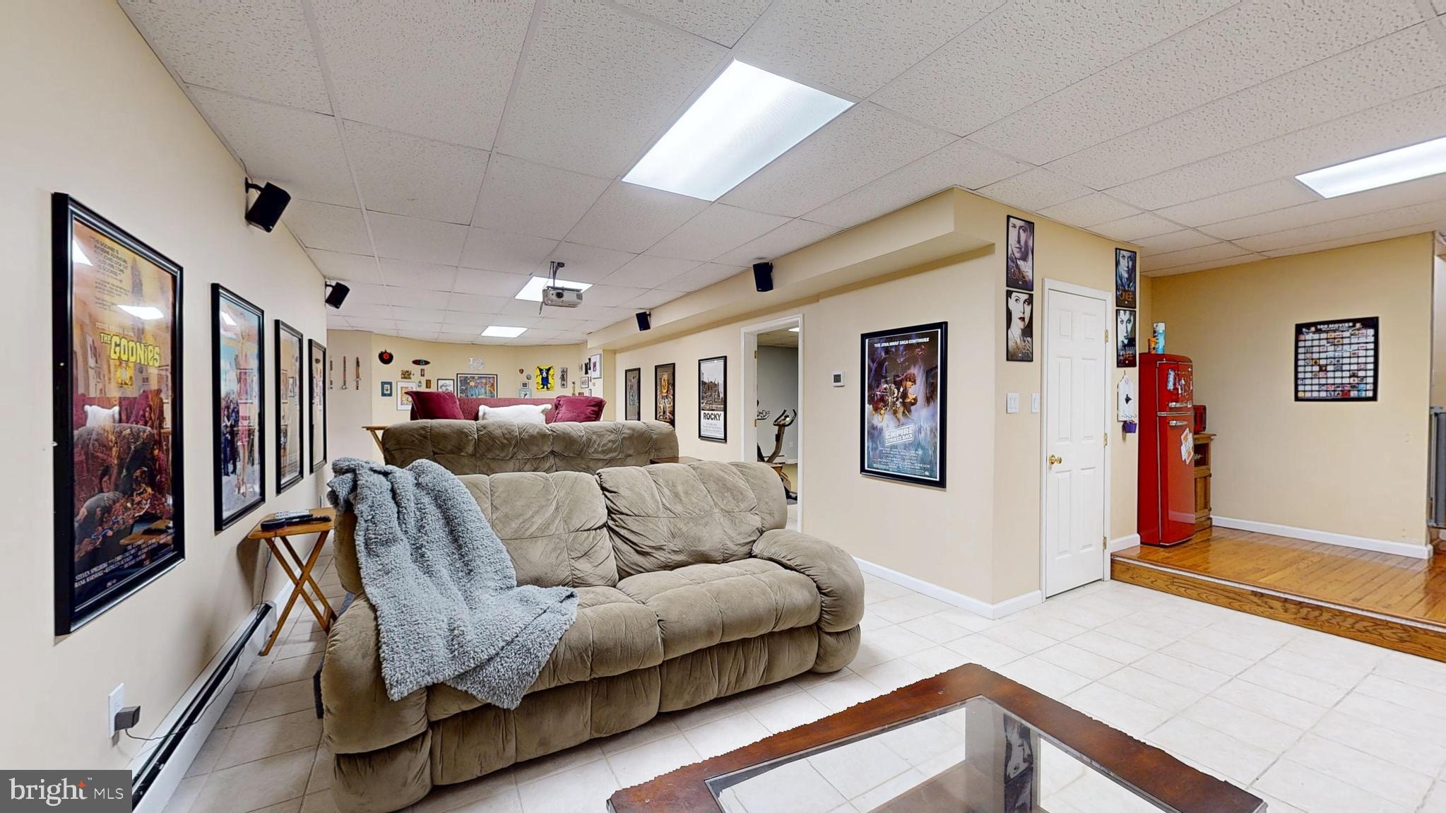 226 Ark Road Mount Laurel, NJ 08054 - Photo 55 of 60 a living room with furniture and a flat screen tv