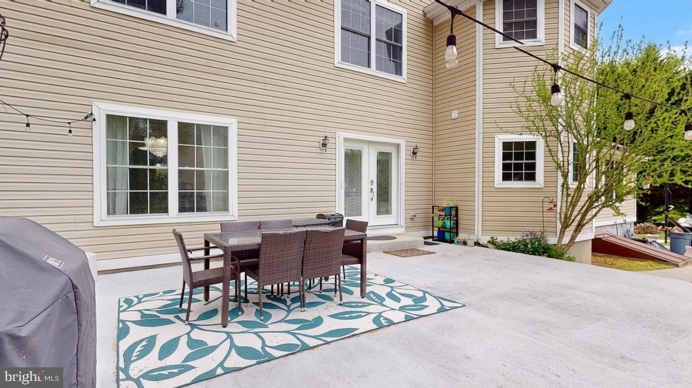 226 Ark Road Mount Laurel, NJ 08054 - Photo 57 of 60 a view of a house with patio and a yard
