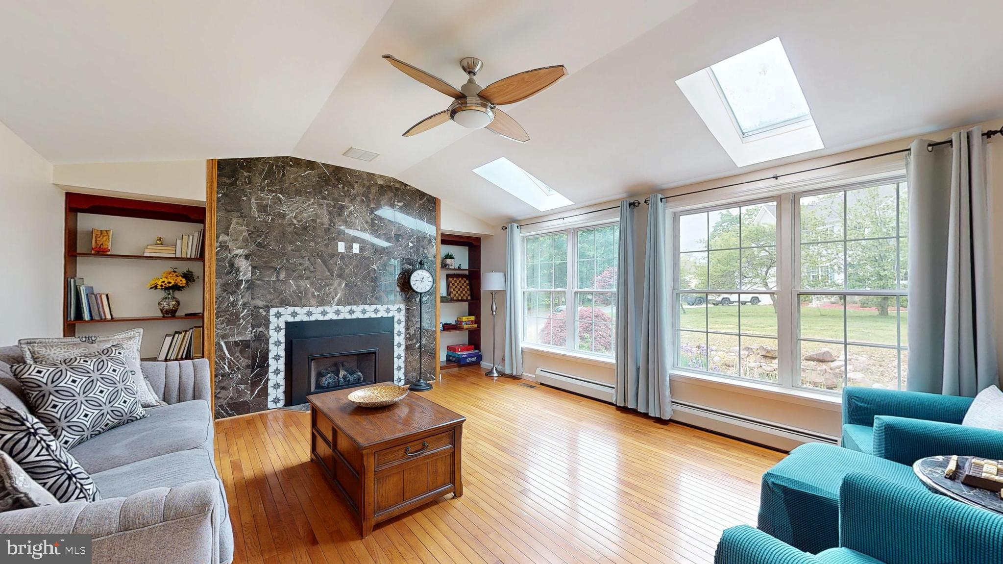 226 Ark Road Mount Laurel, NJ 08054 - Photo 6 of 60 a living room with furniture and a fireplace