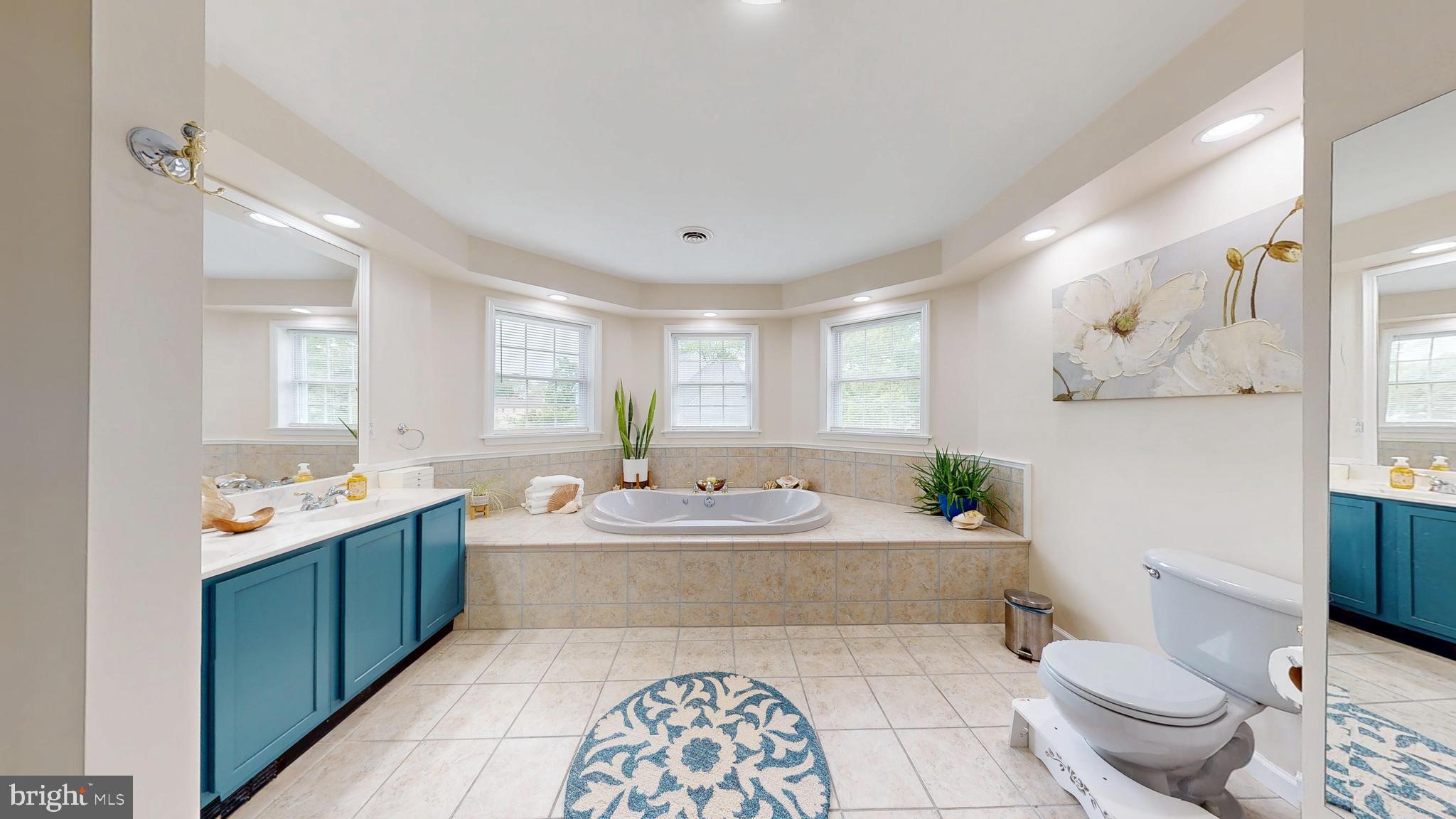 226 Ark Road Mount Laurel, NJ 08054 - Photo 9 of 60 a spacious bathroom with a double vanity sink mirror and toilet