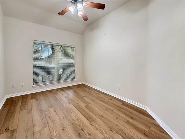 a view of a backyard with pathway