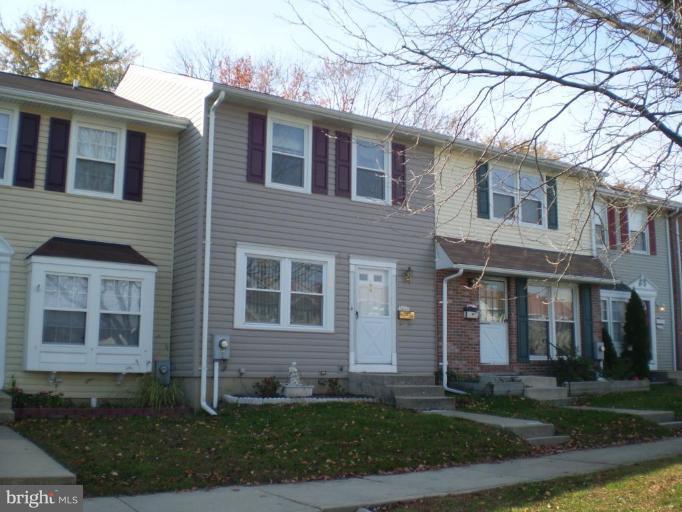 5447 Princess Drive Rosedale, MD 21237 - Photo 1 of 16 a front view of a house with garden