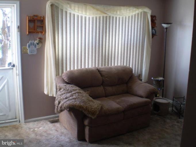 5447 Princess Drive Rosedale, MD 21237 - Photo 15 of 16 a living room with furniture and a window