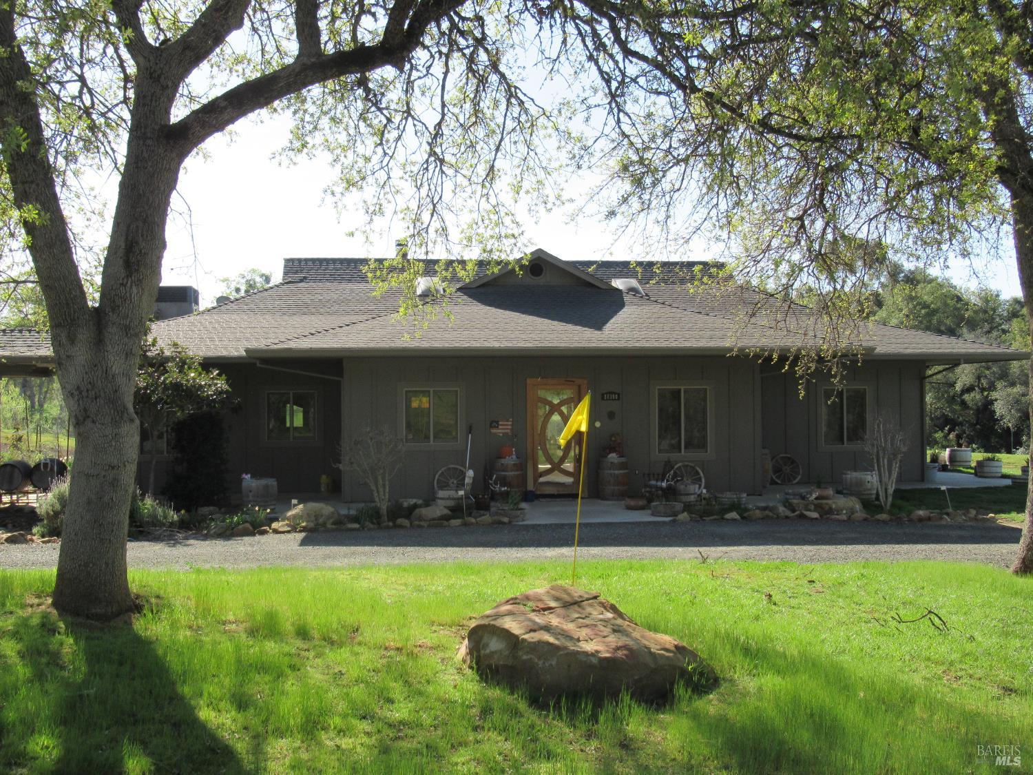 18300 Morgan Valley Road Lower Lake, CA 95457 - Photo 13 of 55 a front view of house with yard and outdoor seating