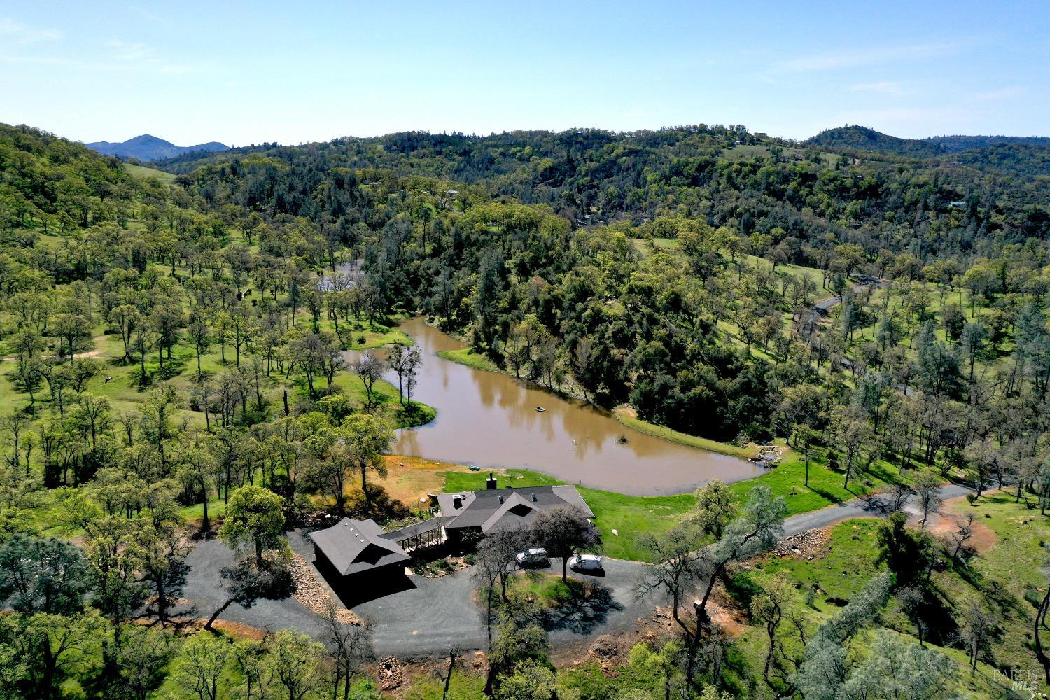 18300 Morgan Valley Road Lower Lake, CA 95457 - Photo 37 of 55 an aerial view of a house with mountain view