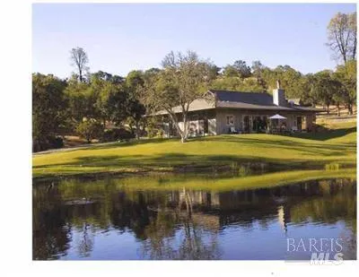 a view of a house with a lake view