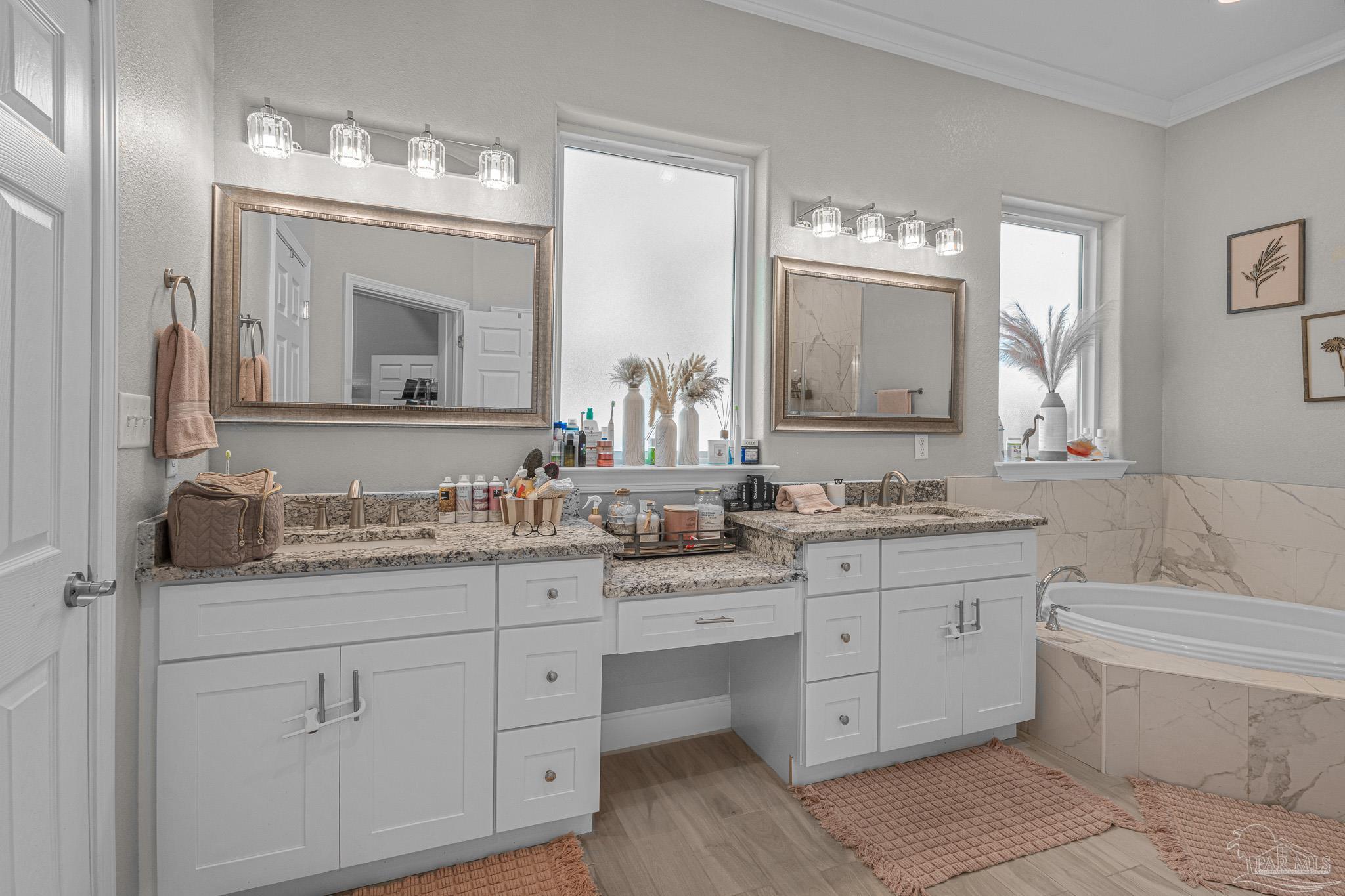 6245 Muldoon Road Pensacola, FL 32526 - Photo 28 of 44 a bathroom with a granite countertop double vanity sink mirror and