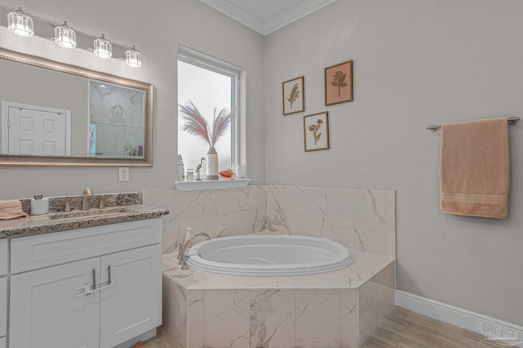 6245 Muldoon Road Pensacola, FL 32526 - Photo 30 of 44 a bathroom with a sink and a mirror