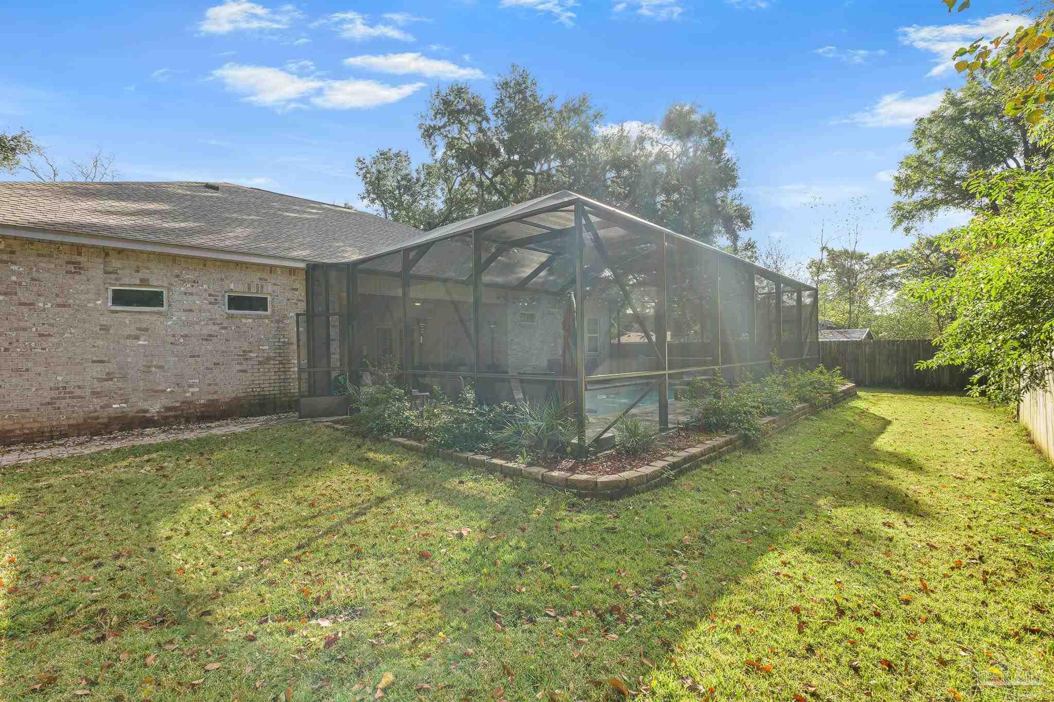 6245 Muldoon Road Pensacola, FL 32526 - Photo 37 of 44 a view of a backyard