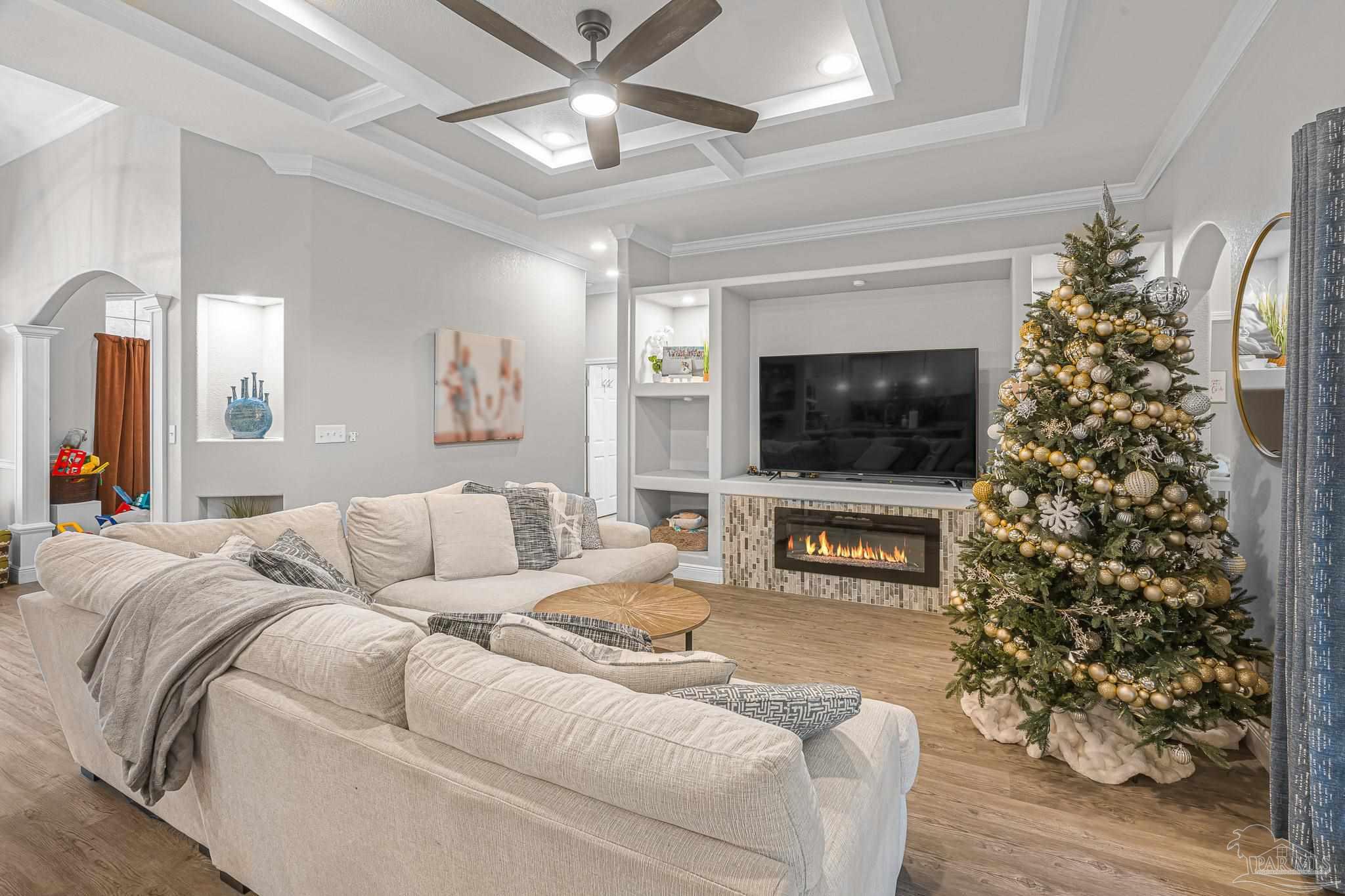 6245 Muldoon Road Pensacola, FL 32526 - Photo 10 of 44 a living room with furniture and a flat screen tv