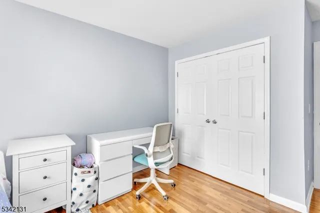 a view of workspace with wooden floor