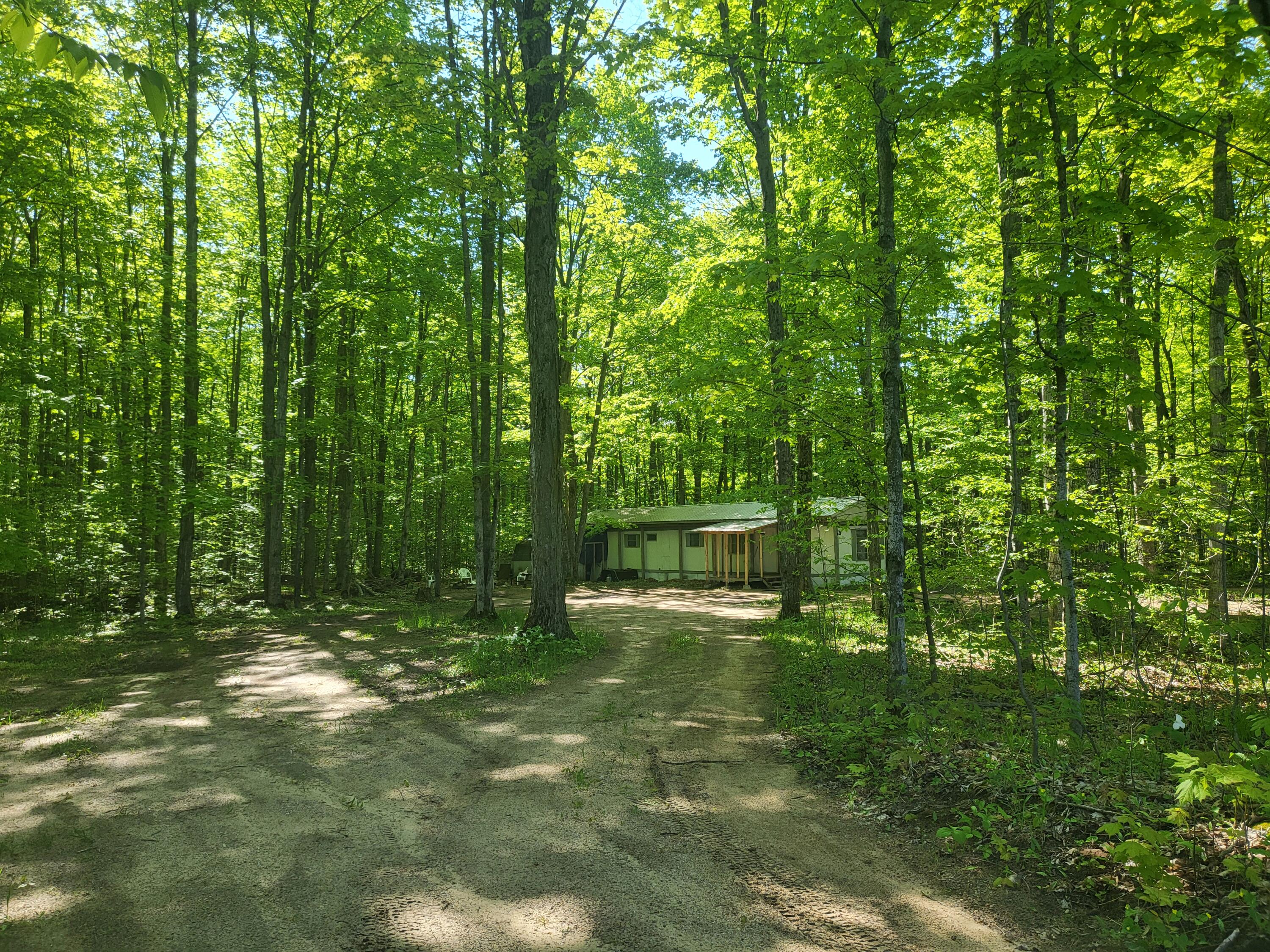 7760 Cunningham Road Northeast Mancelona, MI 49659 - Photo 1 of 38 Gallery Image 1