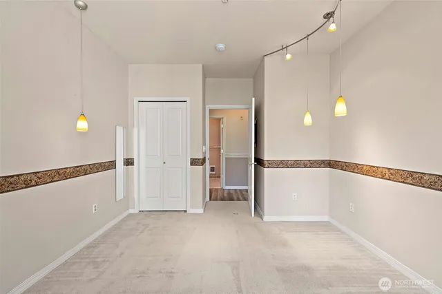 a view of an empty room and window