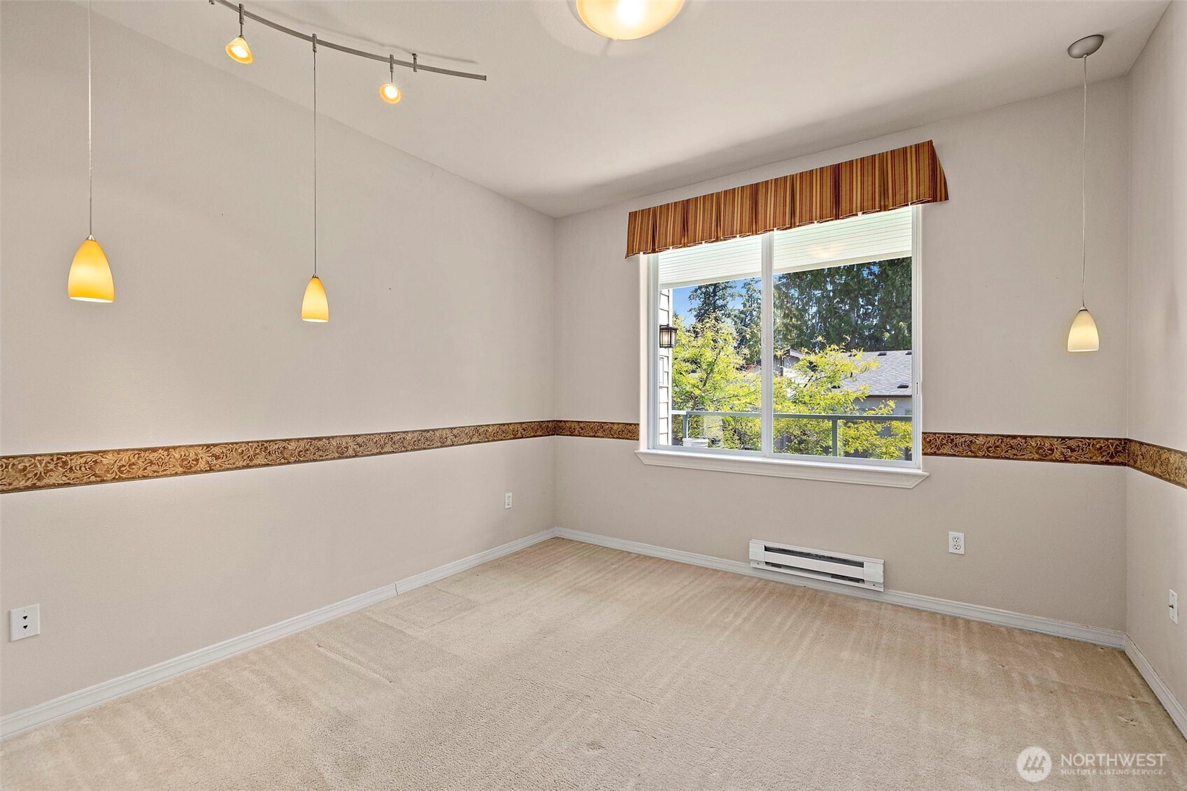 6831 Northeast 170th Street, Unit 306 Kenmore, WA 98028 - Photo 20 of 32 a view of an empty room with a window