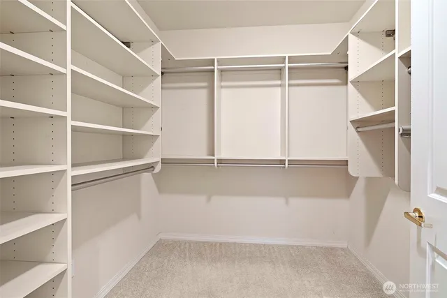 a view of an empty walk in closet