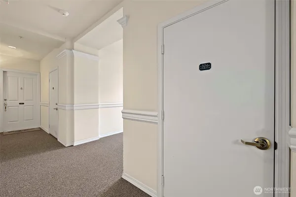 a view of a closet area in a room