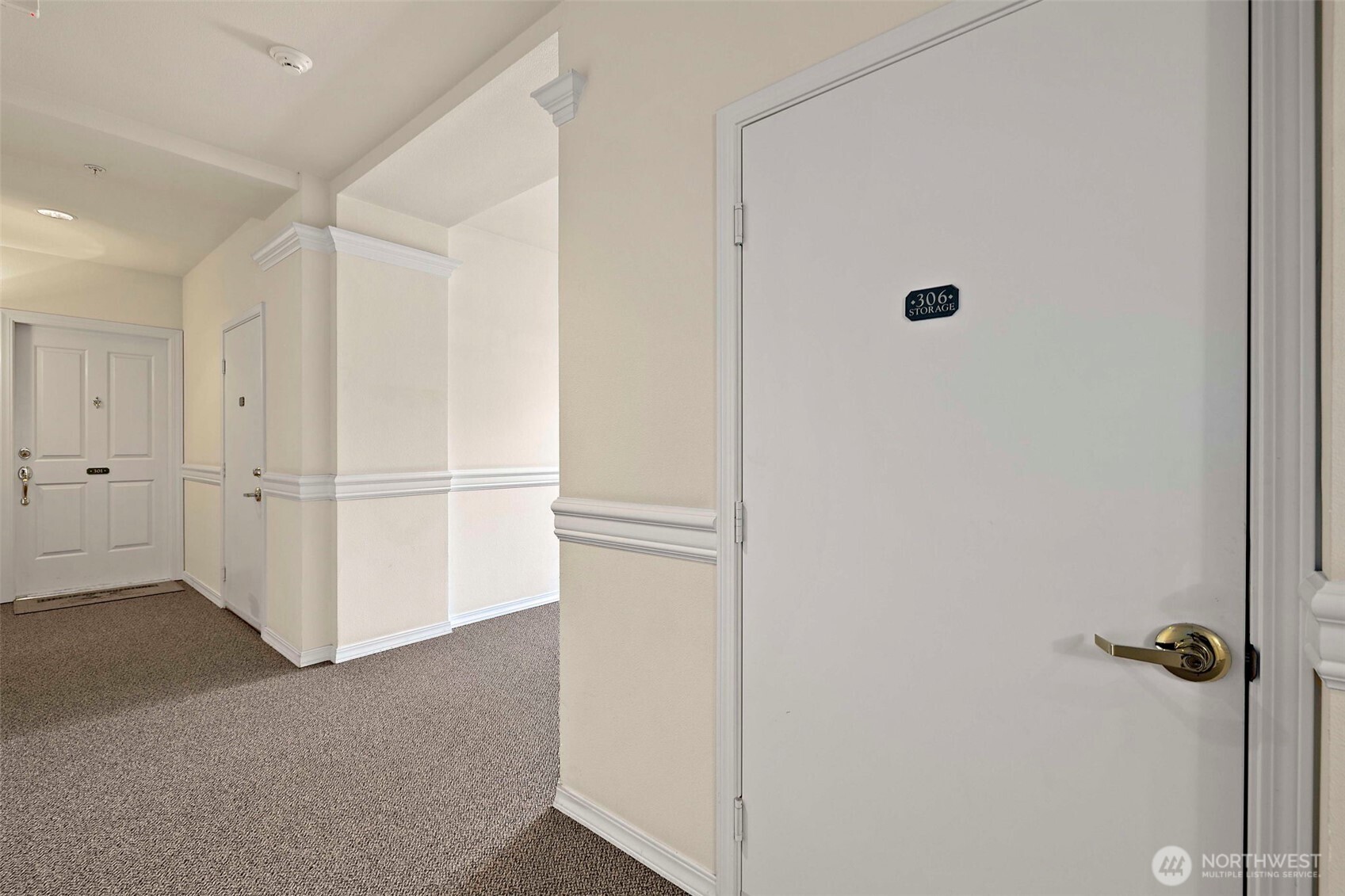 6831 Northeast 170th Street, Unit 306 Kenmore, WA 98028 - Photo 27 of 32 a view of a closet area in a room
