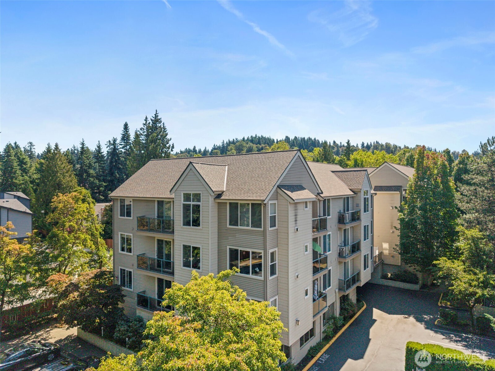 6831 Northeast 170th Street, Unit 306 Kenmore, WA 98028 - Photo 31 of 32 a view of a city with tall buildings
