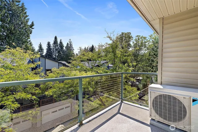 a view of balcony with furniture