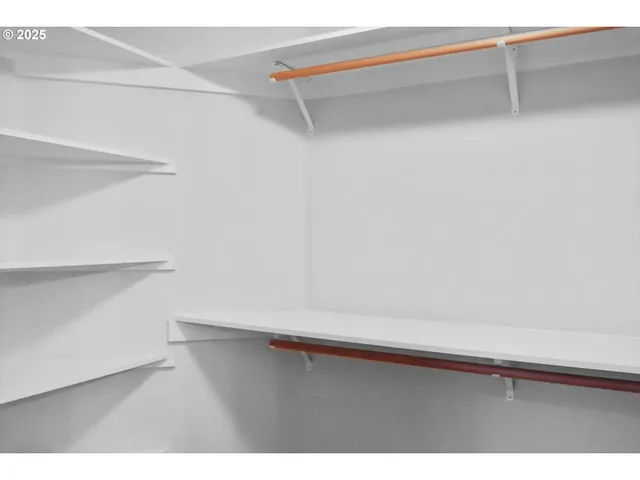 a view of small space with racks on the wall