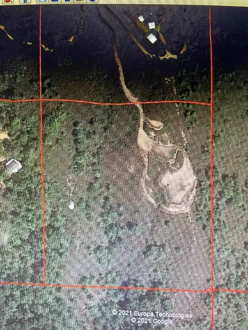 a view of an ocean and mountain