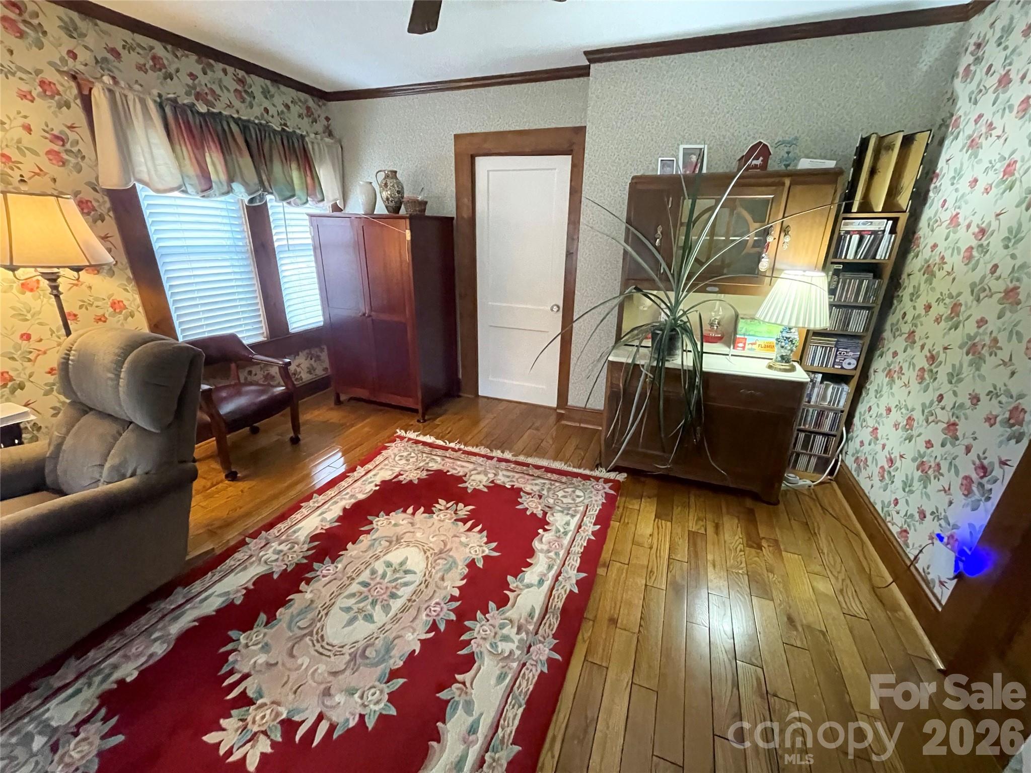 20809 Biles Road Albemarle, NC 28001 - Photo 11 of 39 a living room with furniture and a rug