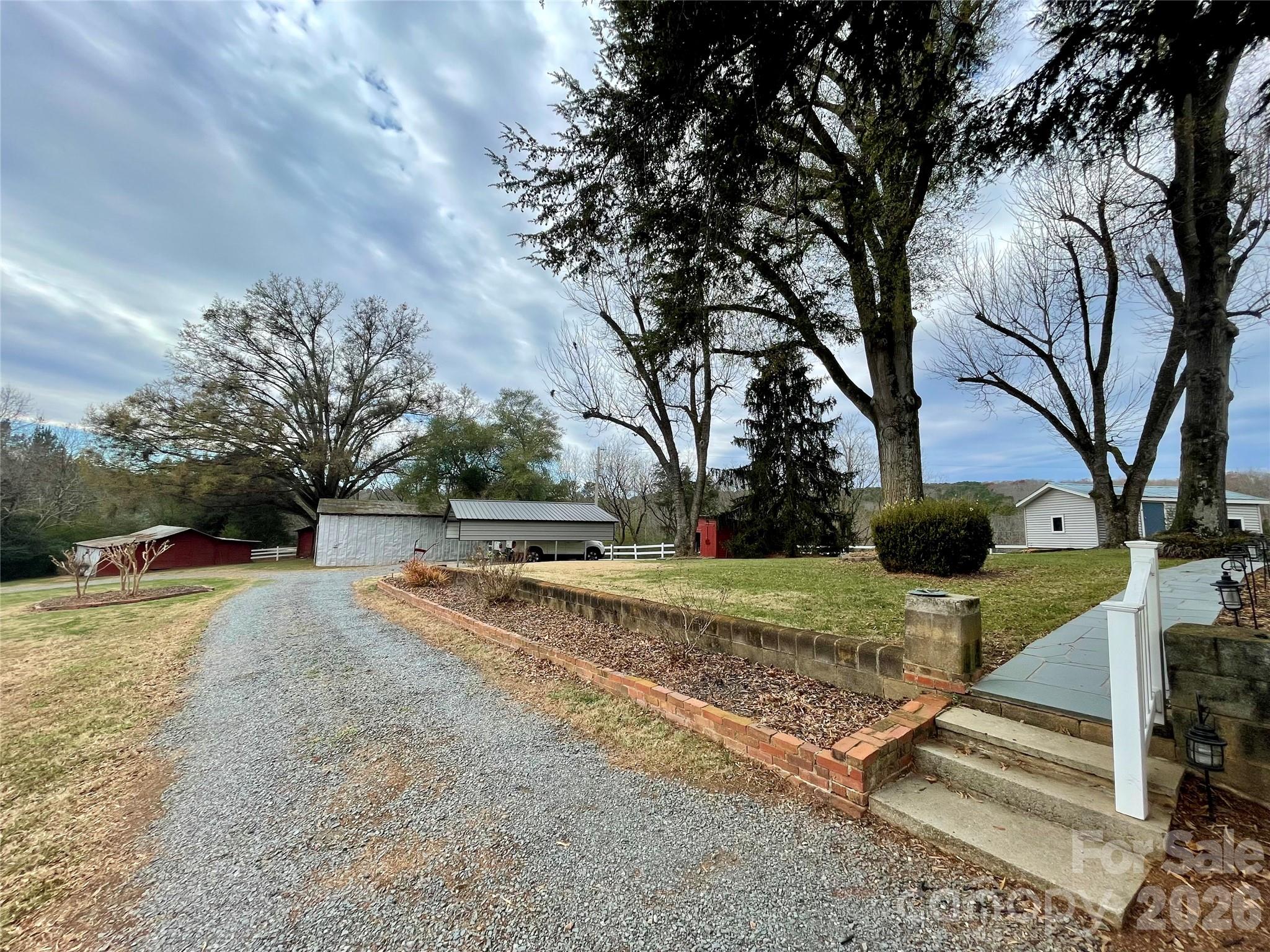 20809 Biles Road Albemarle, NC 28001 - Photo 29 of 39 a view of backyard with tree