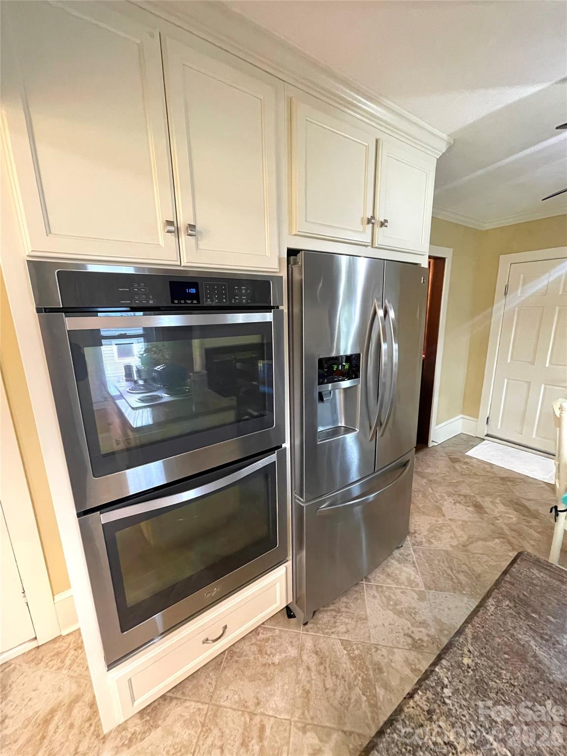 20809 Biles Road Albemarle, NC 28001 - Photo 3 of 39 a kitchen with granite countertop a refrigerator and a stove