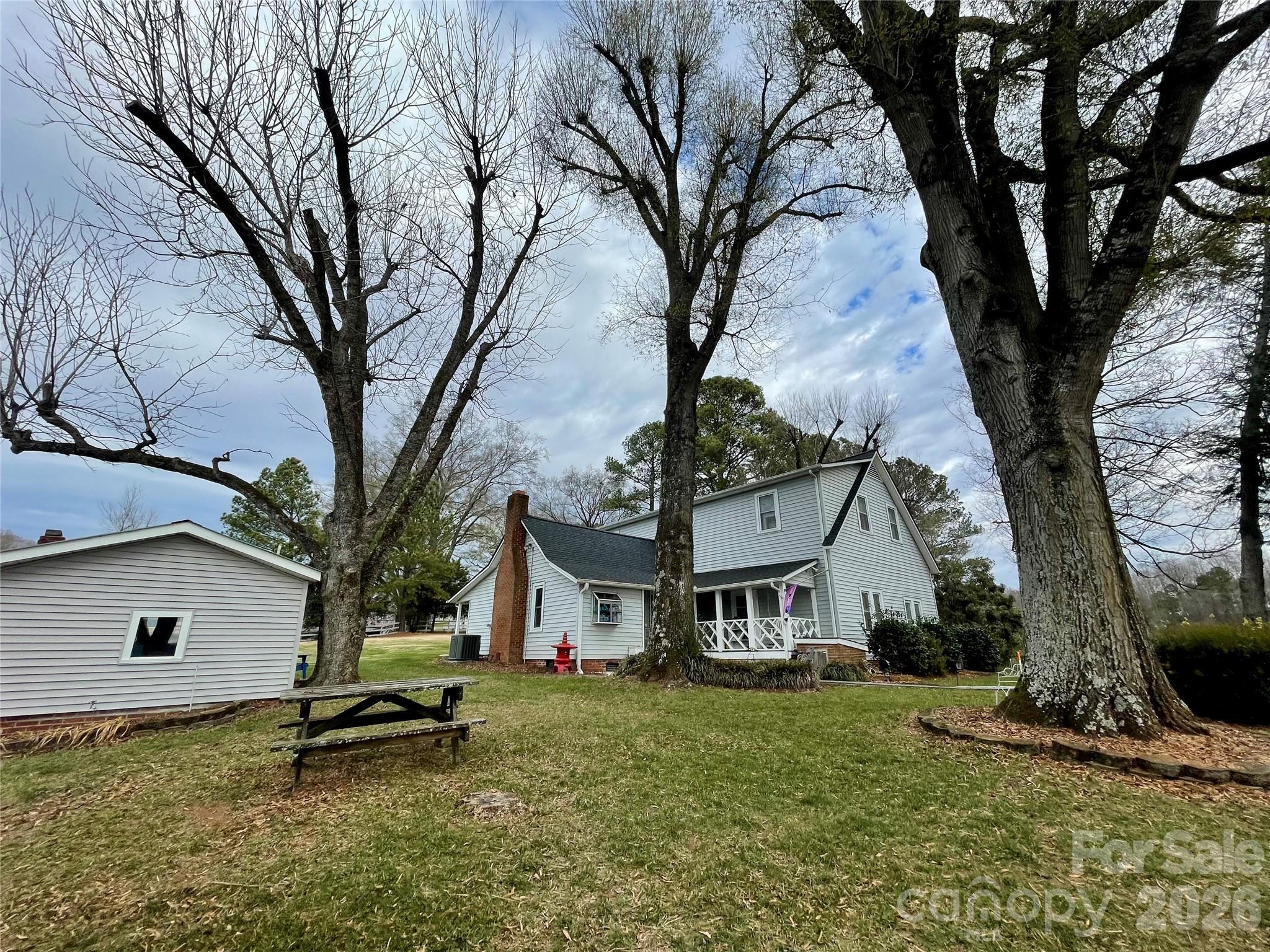 20809 Biles Road Albemarle, NC 28001 - Photo 32 of 39 a view of a house with a yard