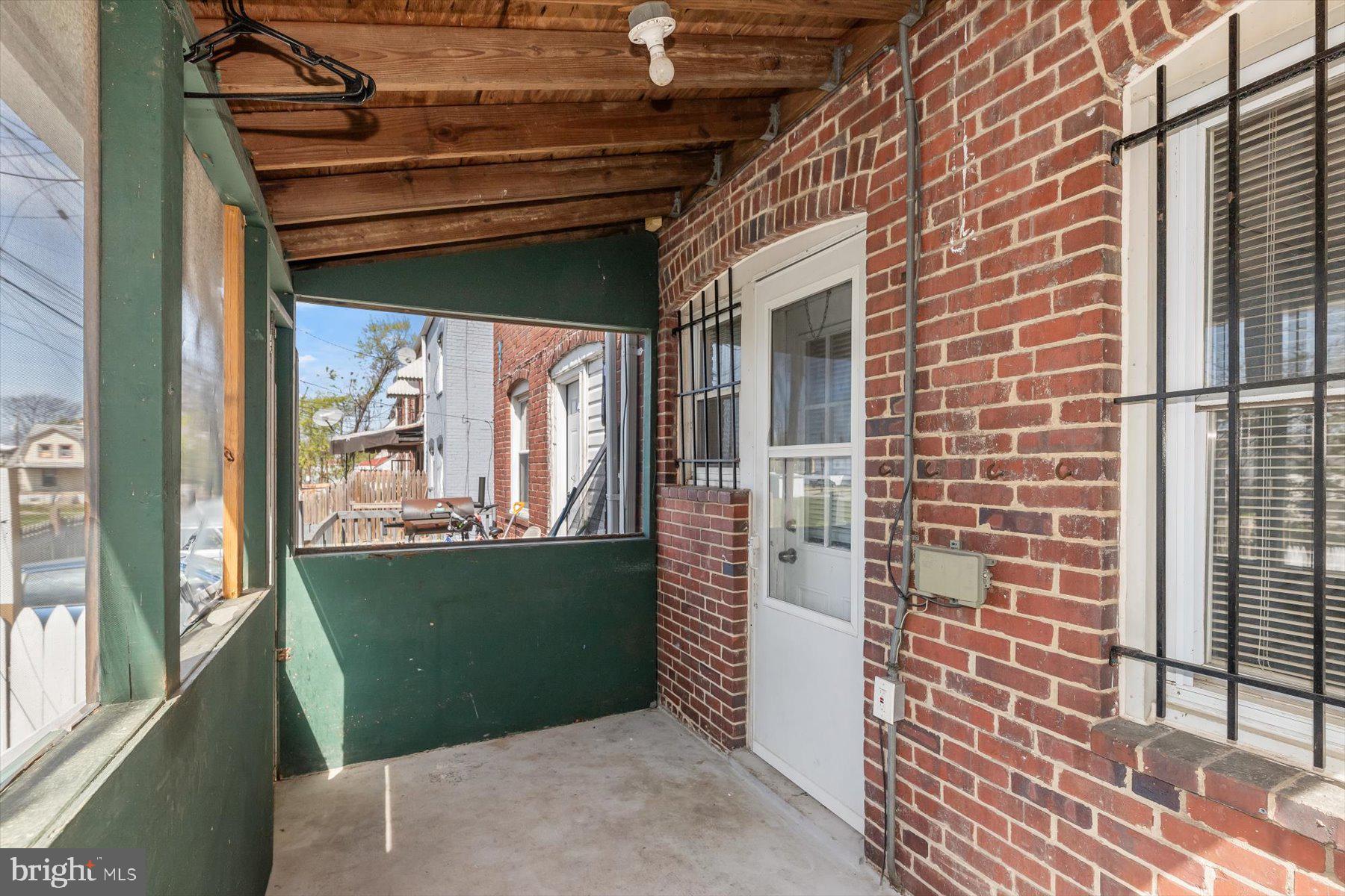 3720 St Victor Street Baltimore, MD 21225 - Photo 18 of 41 a view of outdoor space and barbecue grill