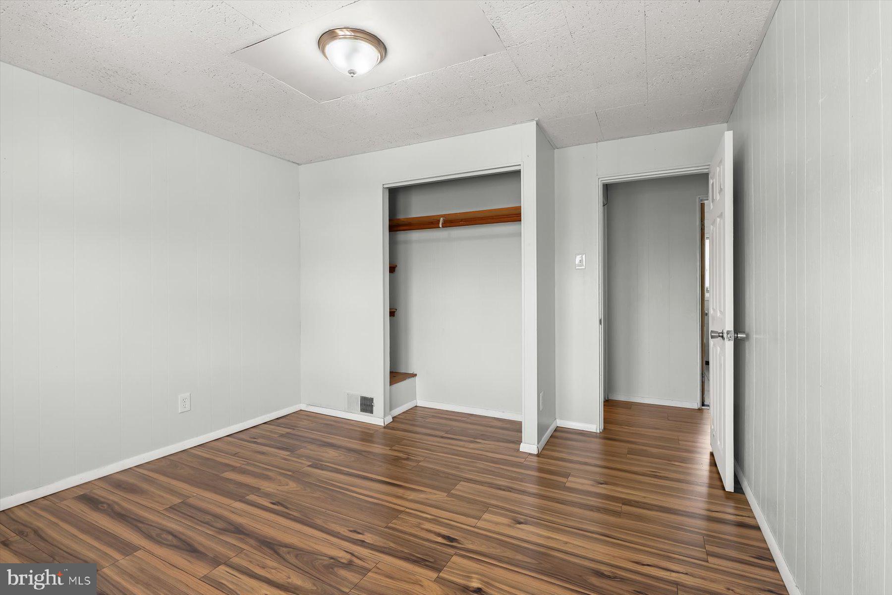 3720 St Victor Street Baltimore, MD 21225 - Photo 22 of 41 a view of a room with wooden floor