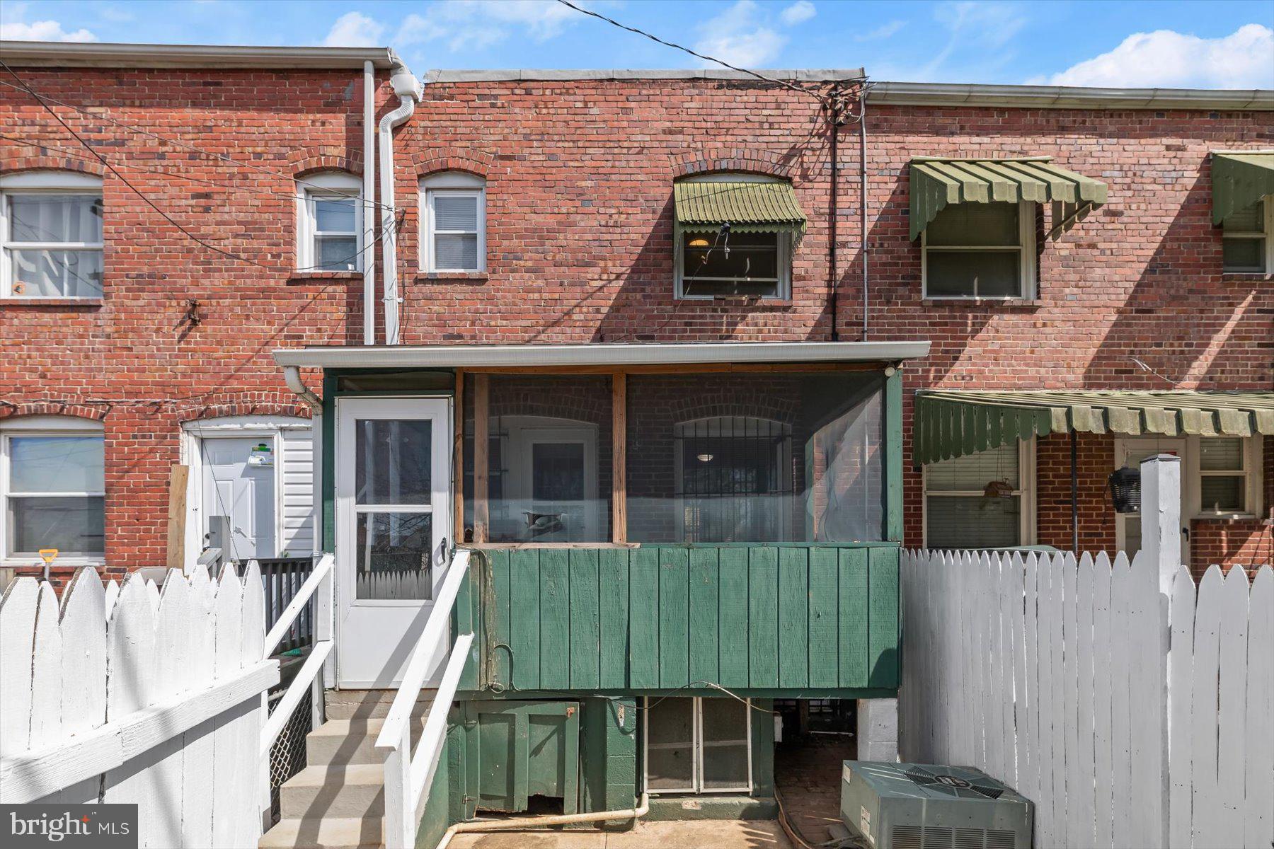 3720 St Victor Street Baltimore, MD 21225 - Photo 34 of 41 a house view with a outdoor space